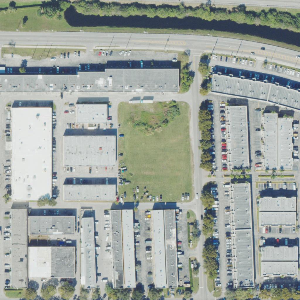 Aerial of a vacant 1.75 acre lot surrounded by warehouses